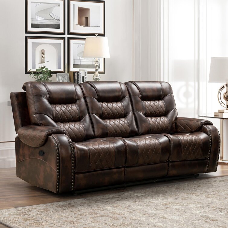 Faux leather 2024 reclining couch